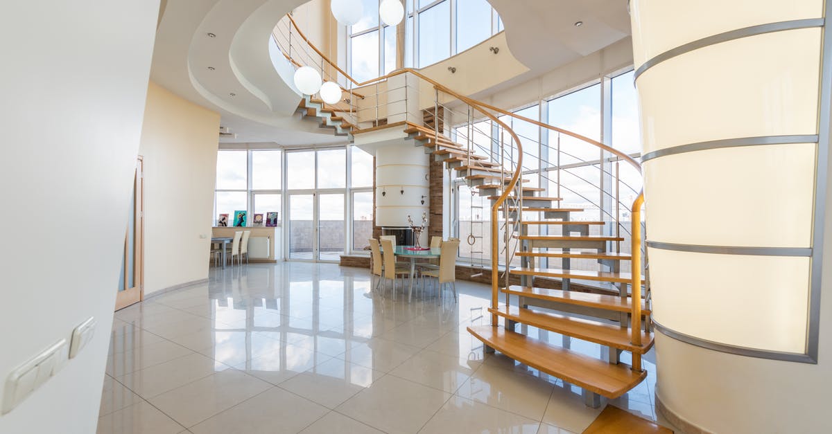 When does the second Captain Marvel post-credits scene take place? - Interior of modern house with staircase