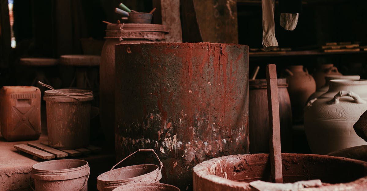 Where did the 2nd Ooze canister come from? - Brown Clay Pots on Brown Wooden Table