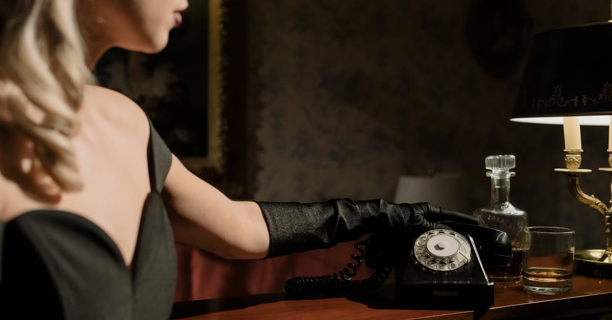 Where did this character pick up another language? - Photo of Woman Picking Up the Telephone