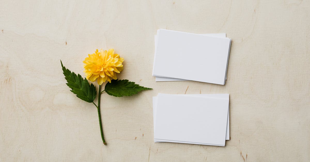 Where do empty 'natural' Sleeves come from? - Blank mockup business cards and yellow flower on desk