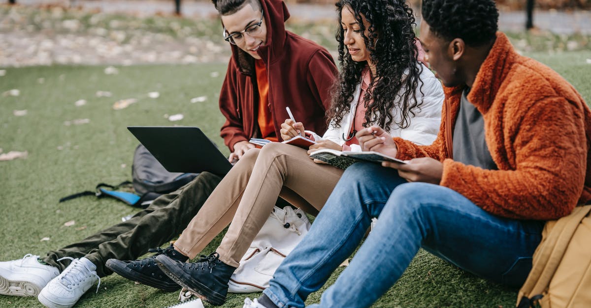 Where does Sara's meeting in LoT S01E16 fall in Arrow timeline? - Young multiracial students in trendy clothes sitting on grass and studying together in autumn park