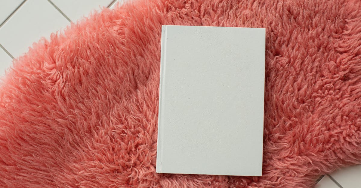 Where does the huntsman come from in the story of Snow White? - Blank white notebook placed on pink carpet
