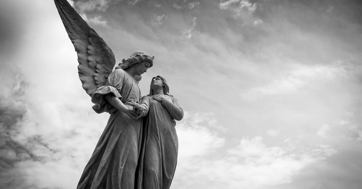 Where is Angel 06 being sent? - Grayscale Photography of Angel Statue Under Cloudy Skies