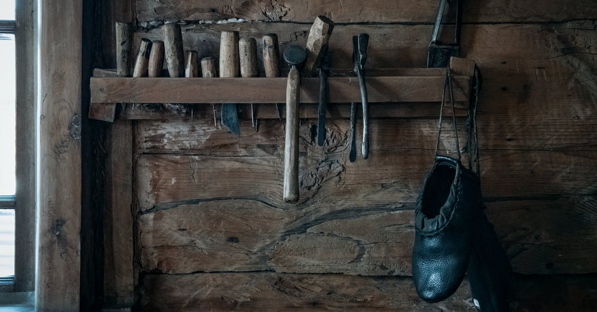 Where is Ann Shoemaker in Shall We Dance? - Shoemaker tools hanging on shelf in rustic wooden workshop