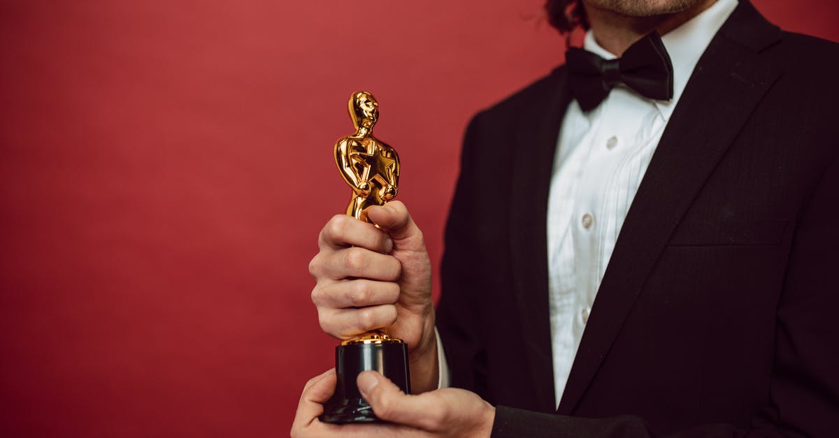 Which Best Actor/Actress Oscar nominee shows up the latest in his/her movie? - An Actor Holding His Award