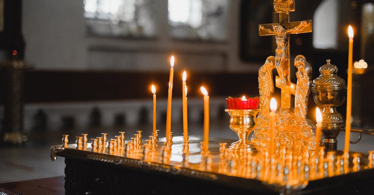 Which Church is Ray a member of? [closed] - Gold Candle Holder With Candles