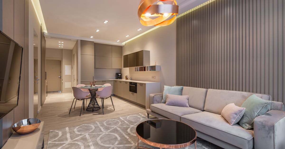 Who is the real villain in the TV series LOST? - Contemporary apartment with kitchen and stylish living zone