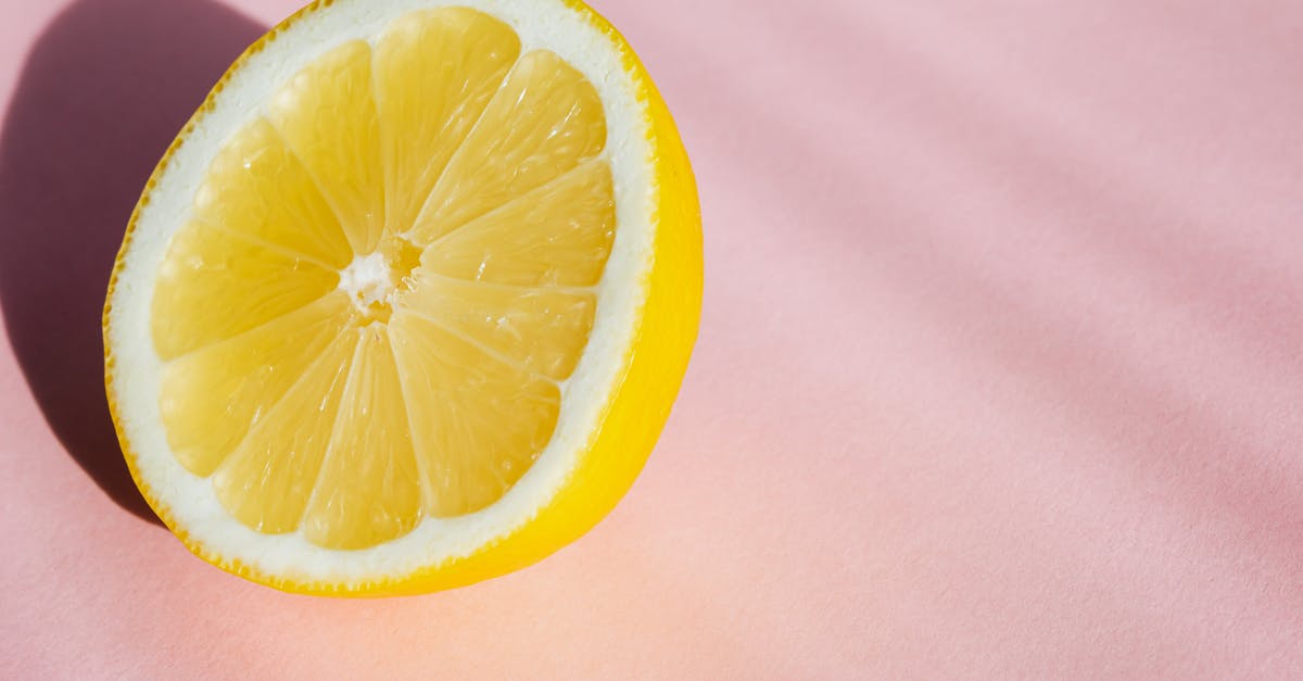 Who judged season one? - From above half of fresh sliced lemon placed in pink background in bright sunlight