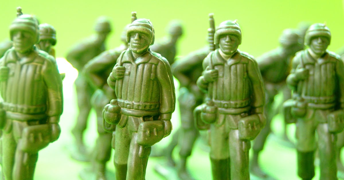 Who machine gunned the Saviours that Carol was being held at gunpoint by? - Marching Soldiers Plastic Figurines