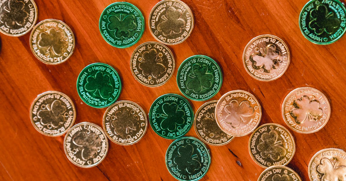 Who portrayed the editor of the Havard Crimson in A Small Circle of Friends (1980)? - Golden and green St Patricks day coins on wooden floor