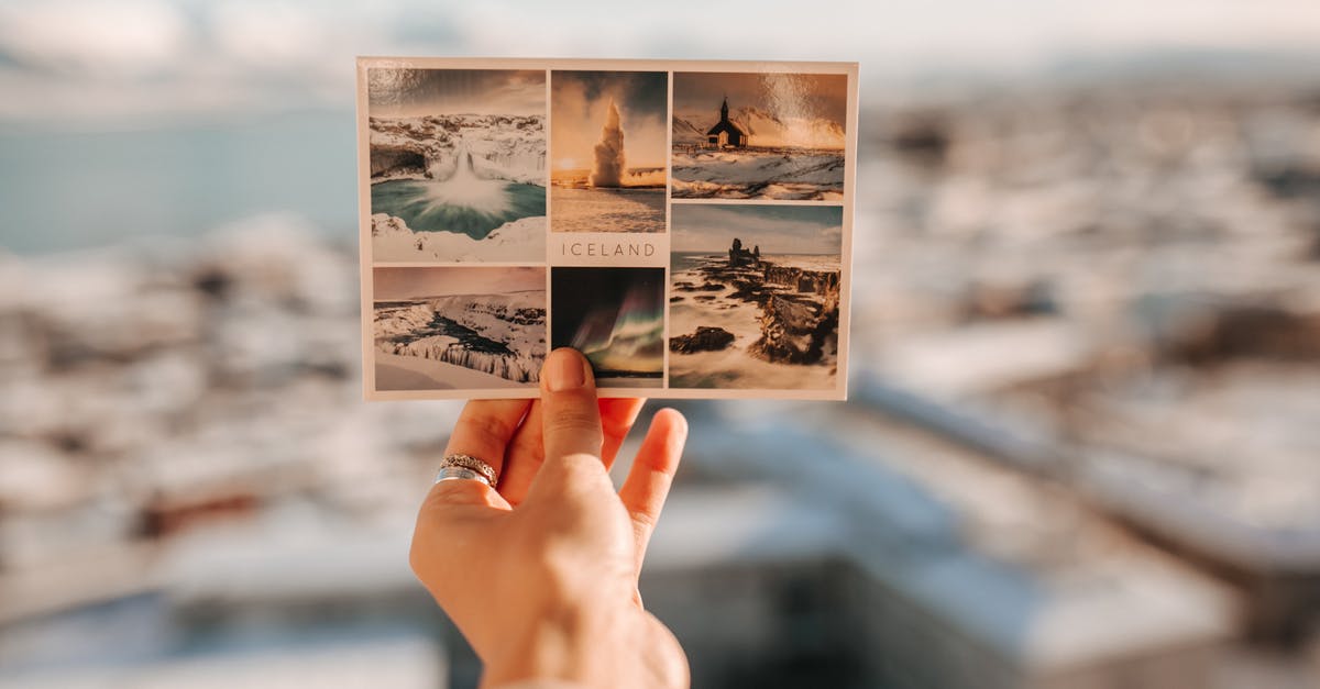 Who sent the postcard in Shang-Chi and the Legend of the Ten Rings? - Person Holding a Postcard of Iceland