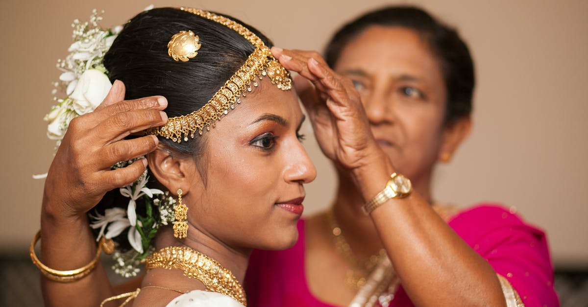 Whom did Grace see instead of her daughter? - Sinhalese woman helping daughter before traditional wedding ceremony