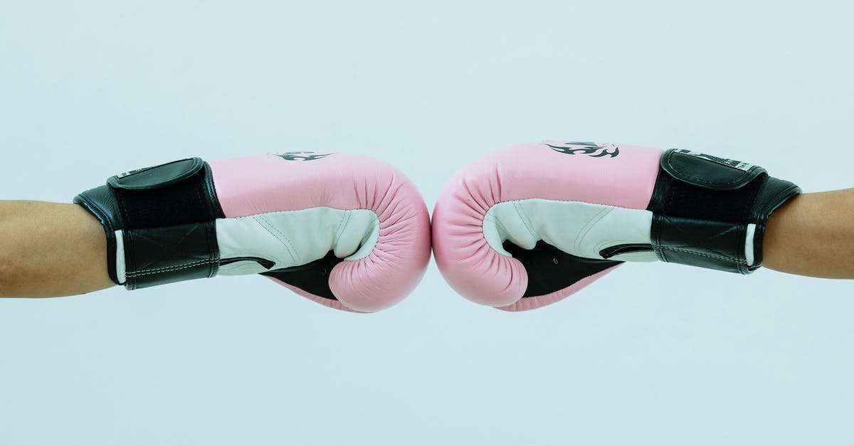 Why are the power rangers so concerned about their identities in *White Light Part II*? - Side view of crop anonymous boxers in pink boxing gloves giving fist bump on white background in light studio