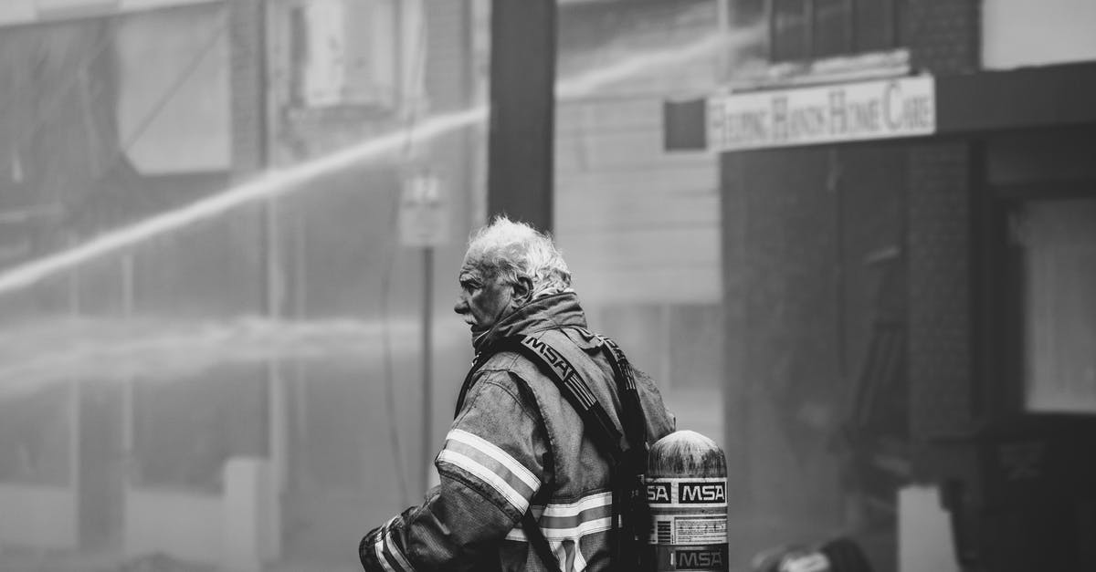 Why are the respondents never shown? - Grayscale Photo of Firefighter