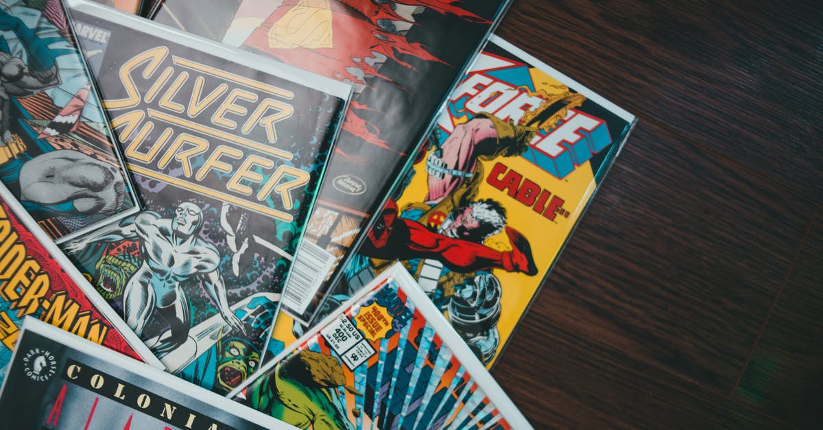 Why are there so many superhero movies made in recent decades? - Assorted comic books with colorful covers on floor