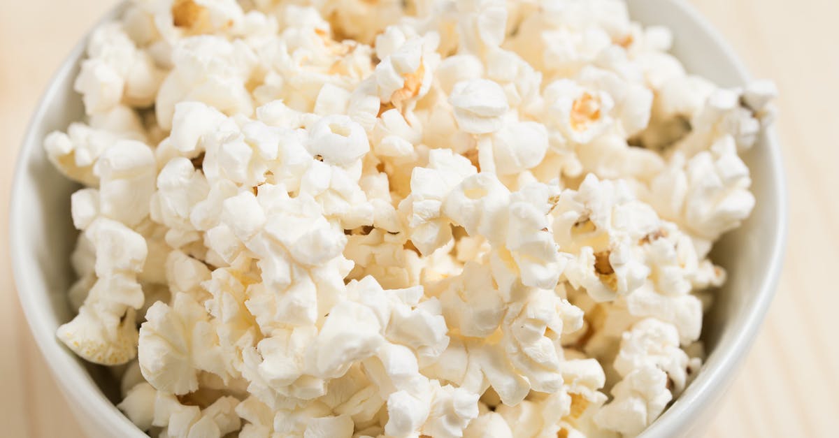 Why can't movies be released in homes? [closed] - White Popcorns on Round White Ceramic Bowl