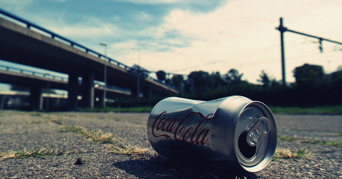Why can't they track Luther's phone? - Shallow Focus Photography of Coca-cola Can