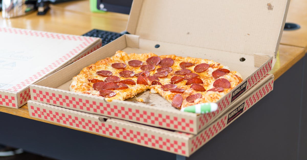 Why Cheese Box may contain nuts? - Pizza With Box on Table