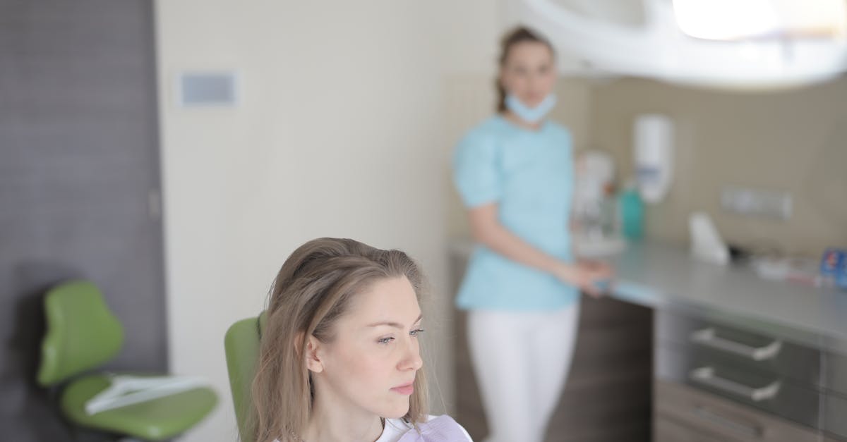 Why Child Protection service tell Lyla to wait for 6 months to fill the form? - Thoughtful young female patient sitting in dental chair and waiting for treatment while looking away in modern dental room in hospital