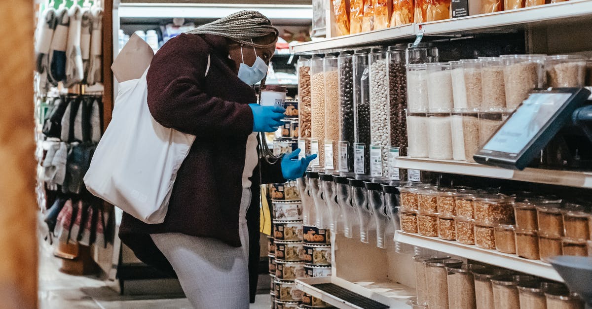 Why choose 'Black Orpheus' (Orfeu Negro)? - Black woman choosing grains in supermarket