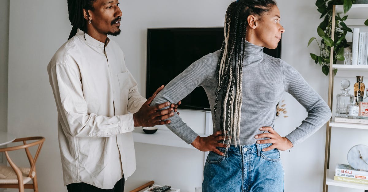 Why did Aaron apologize to Outcome #3? - African American stylish man apologizing to sad girlfriend while having conflict at home
