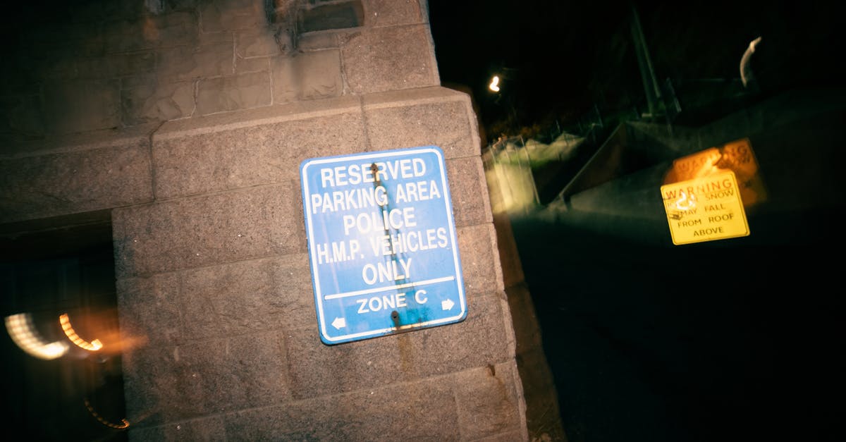 Why did Anakin & Padme risk having their forbidden marriage witnessed? - Signboard restricting parking for cars on reserved area for police vehicles at night