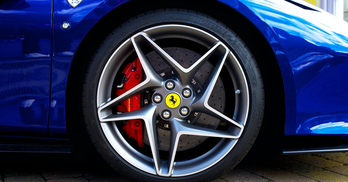 Why did Carroll Shelby toss a nut into the Ferrari pit? - Blue and Silver Bmw Wheel