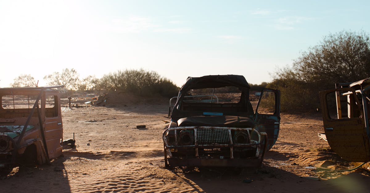 Why did Cassian Andor abandon his mission? - Rusty broken cars placed on sand