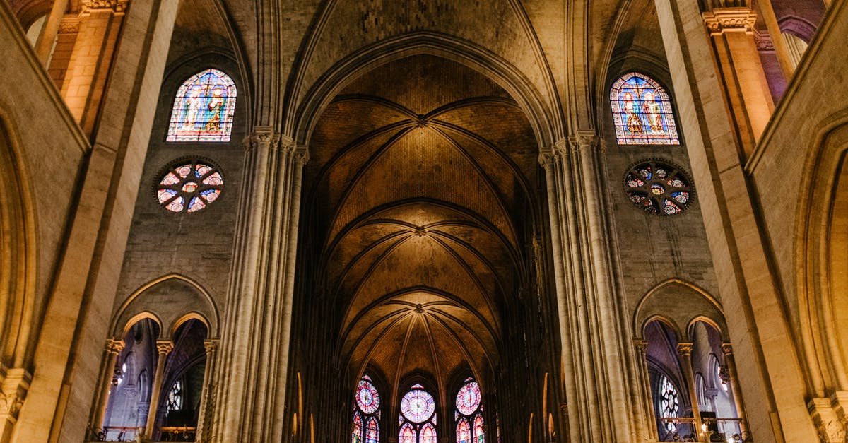 Why did Church believe Barney owed him? - Ornamental ceiling with arched mosaic windows of church