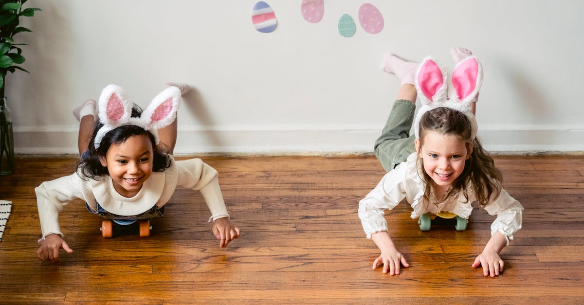 Why did everyone laugh hysterically at Howard and Myron in the toy store? - Diverse preschool girls having fun while riding on floor with toy rabbit ears