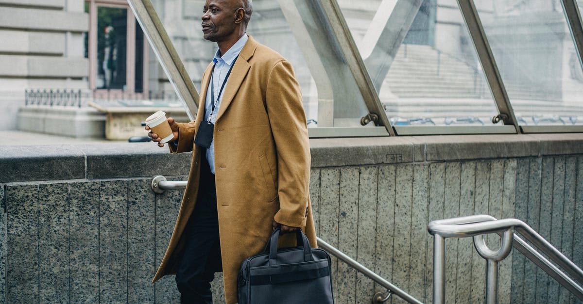 Why did Hugh Jackman leave the X-Men franchise? [duplicate] - Contemplative black businessman leaving metro station