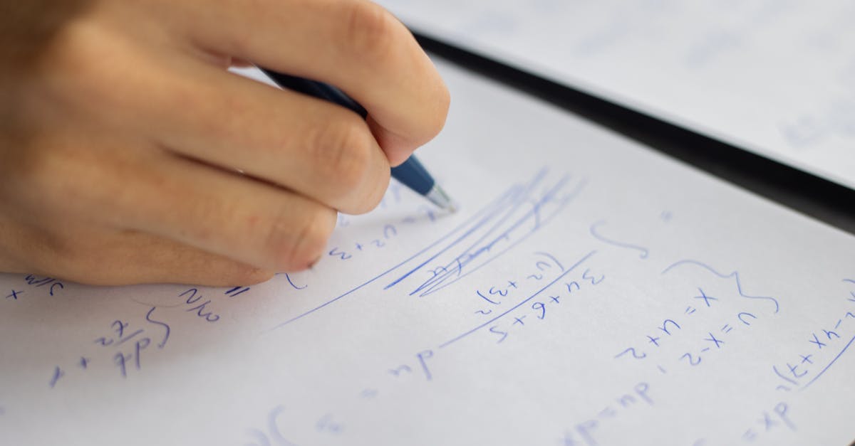 Why did humans want to solve the gravity equation? [duplicate] - Unrecognizable smart student taking notes on piece of paper while solving mathematical formulas during lesson in classroom on blurred background