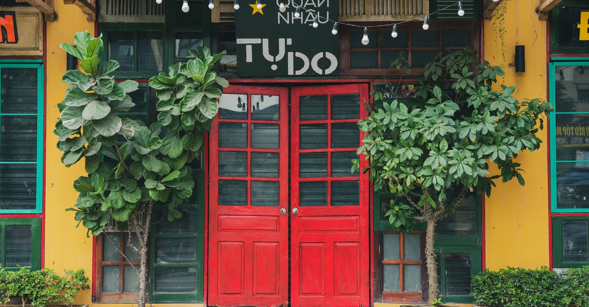 Why did It not do this to The Losers? - A  Restaurant with Red Double Doors at the Entrance