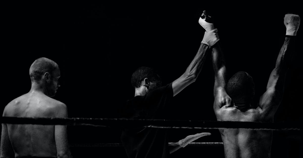 Why did Jennifer lose all her powers just from losing the BFF chain? - Grayscale Photography of Man Holding Boxer's Hand Inside Battle Ring