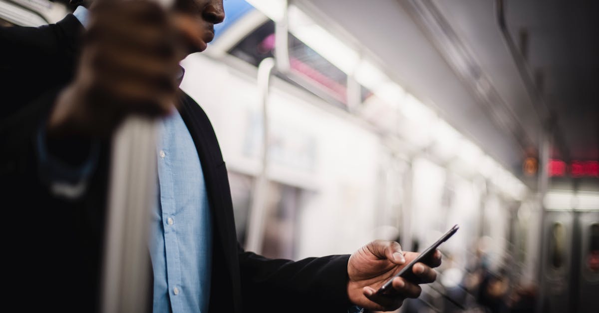 Why did John Milton bother the guy in the subway train? - Black man using mobile while commuting by train