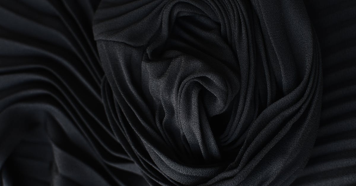 Why did Paul return from the darkness? - Black pleated fabric placed on table