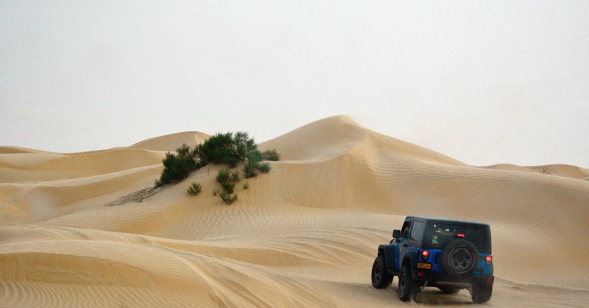 why did Silva steal the hard drive in Skyfall? - Blue Jeep Wrangler on Desert