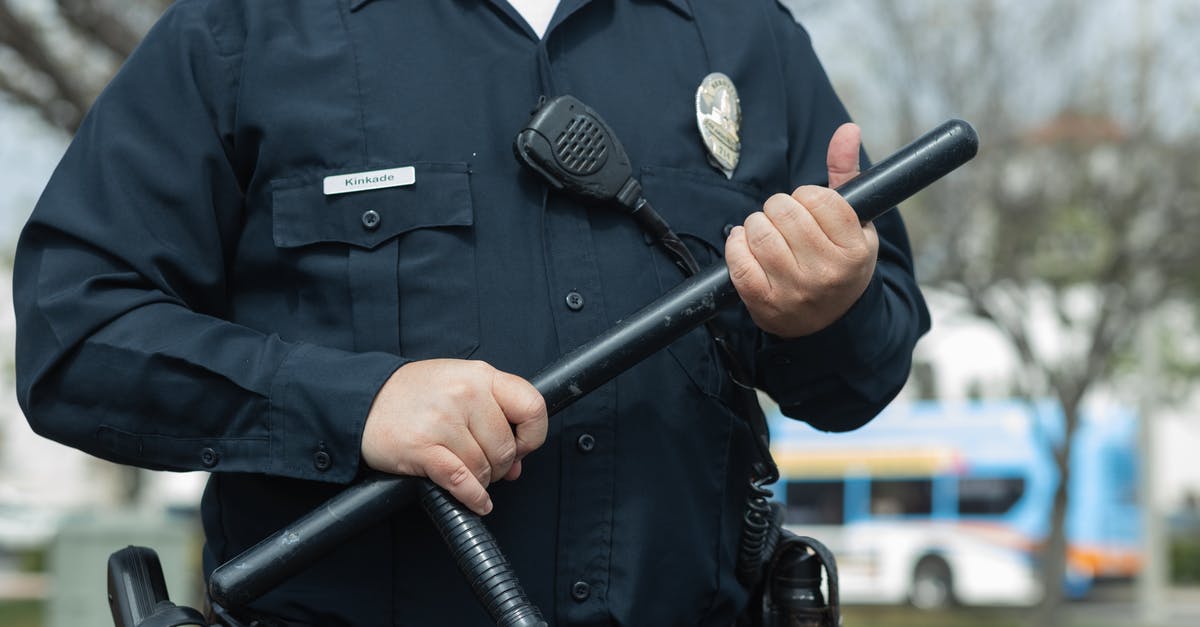 Why did the cop make this decision? - Man in Black Police Uniform Holding Black Metal Rod