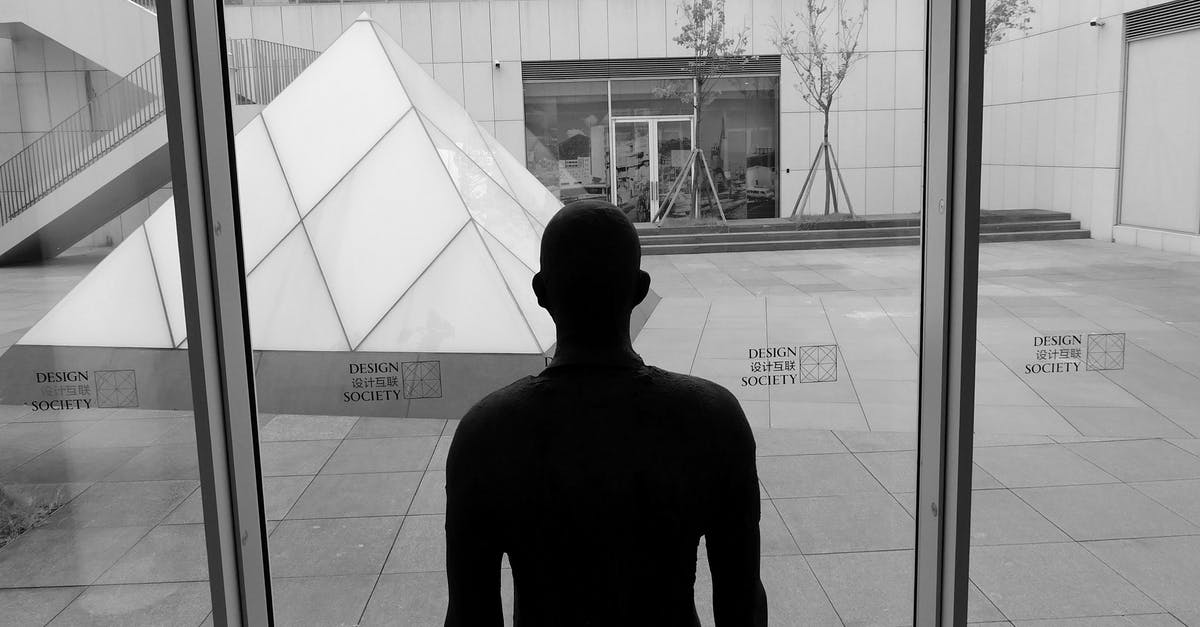 Why did the Devil's Triangle only curse the crew of the Silent Mary? - Black and white of dummy silhouette in modern building against triangle on tiled walkway in city