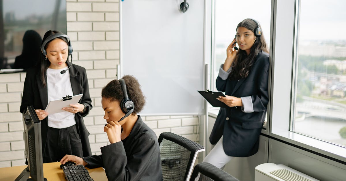 Why did the operators just came to the house? - Three Women in Black Blazers With Headsets Working As Customer Support Agents