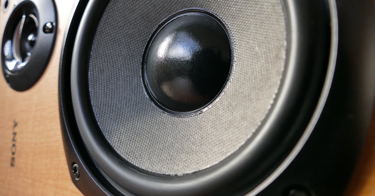 Why did the tripods make a loud horn sound? - Closed Up Photography of Brown Wooden Framed Sony Speaker