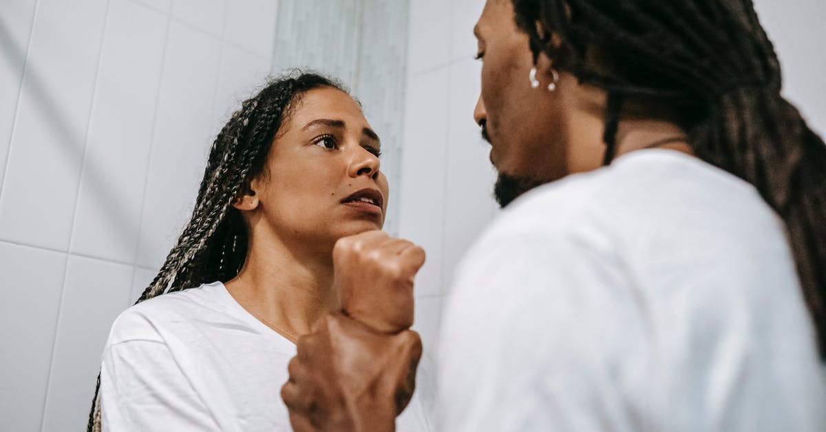 Why did these 'creatures' fight each other? - Anxious black couple arguing in bathroom