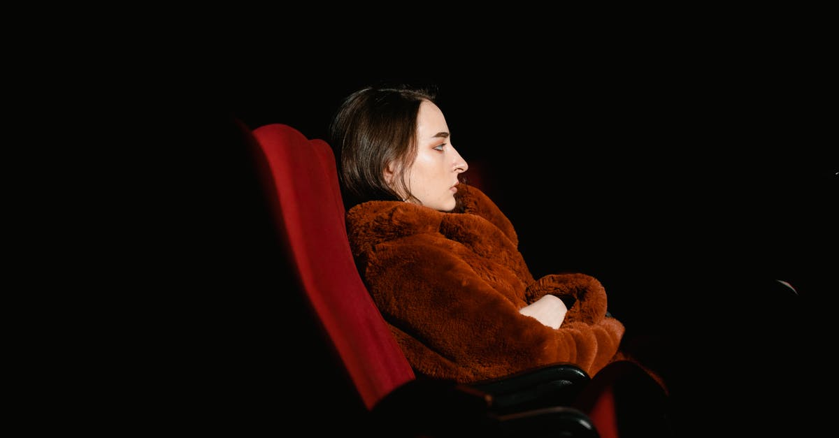 Why did they *kill* Mr. Hengist in “Wolf in the Fold”? - Woman in Red Sweater Sitting on Red Chair
