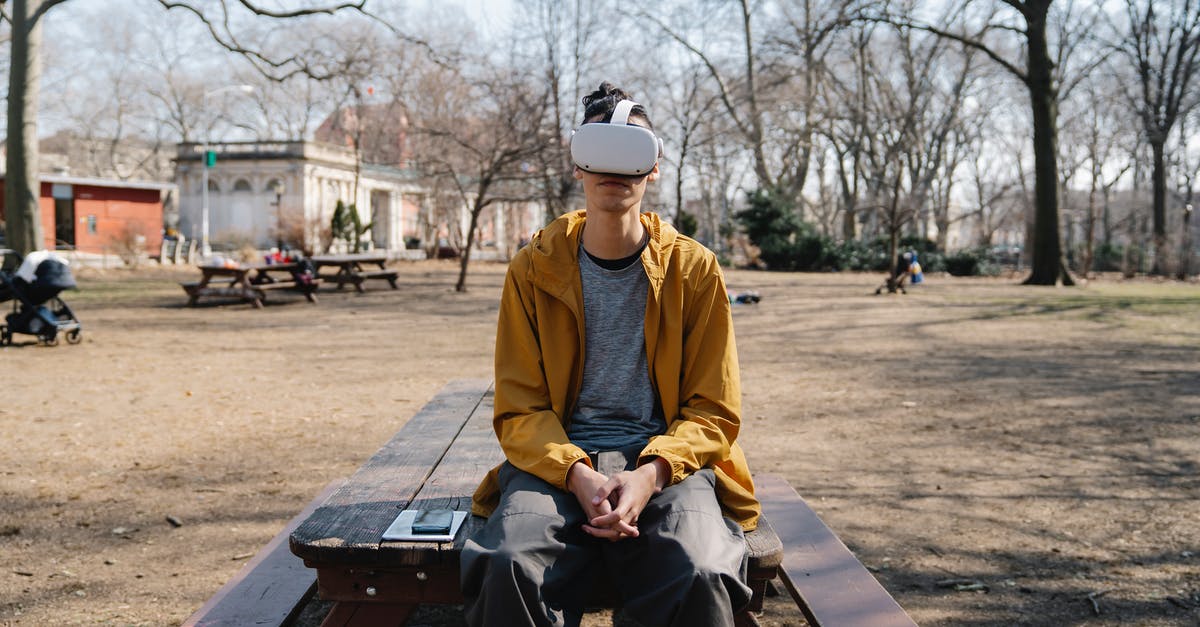 Why didn't Chuck use the glasses after Morgan at the end of season 4? - Young man sitting on bench in park with VR headset