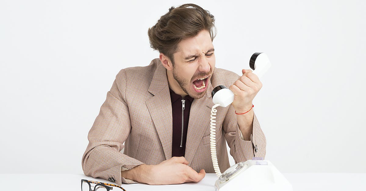 Why didn't Hank or Gomez call for help? - Man Wearing Brown Suit Jacket Mocking on White Telephone