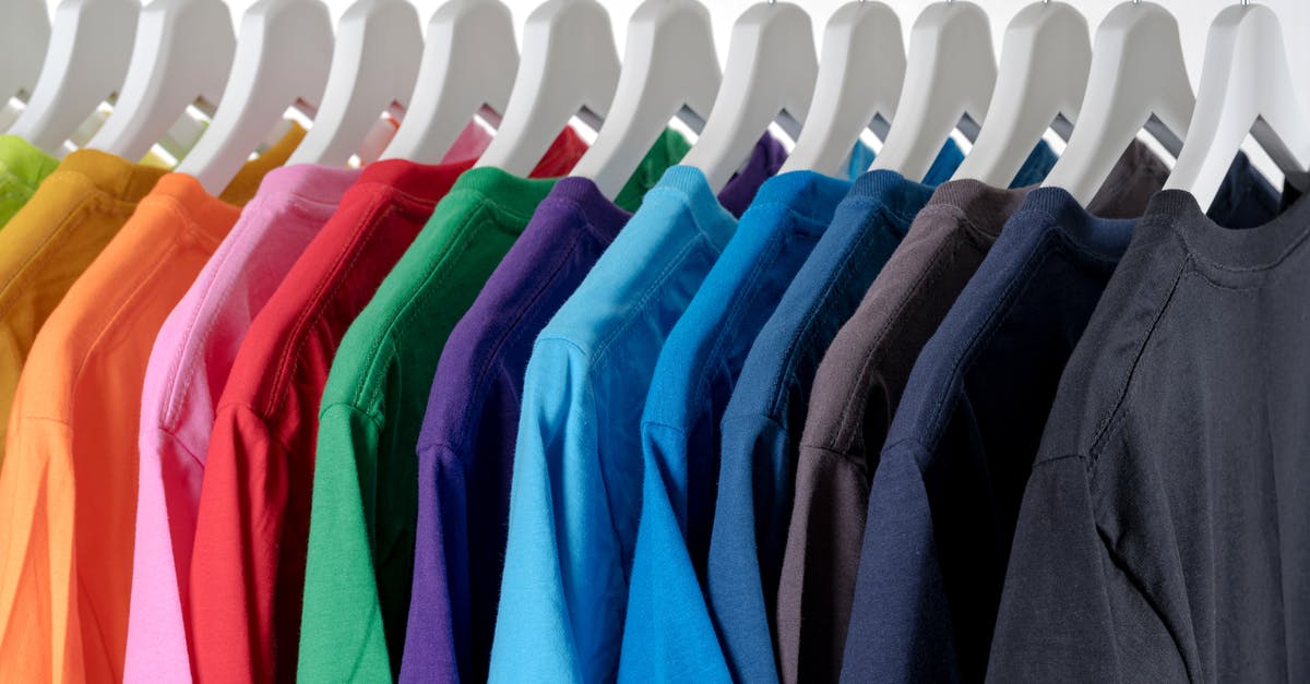Why didn't Jacob choose Richard as protector of the island? - Rack with symmetric hangers of colorful stylish t shirts against white wall in store