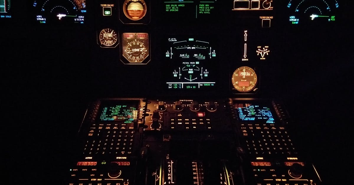 Why didn't the plane crash despite its cockpit having a big hole? - Black Multicolored Control Panel Lot