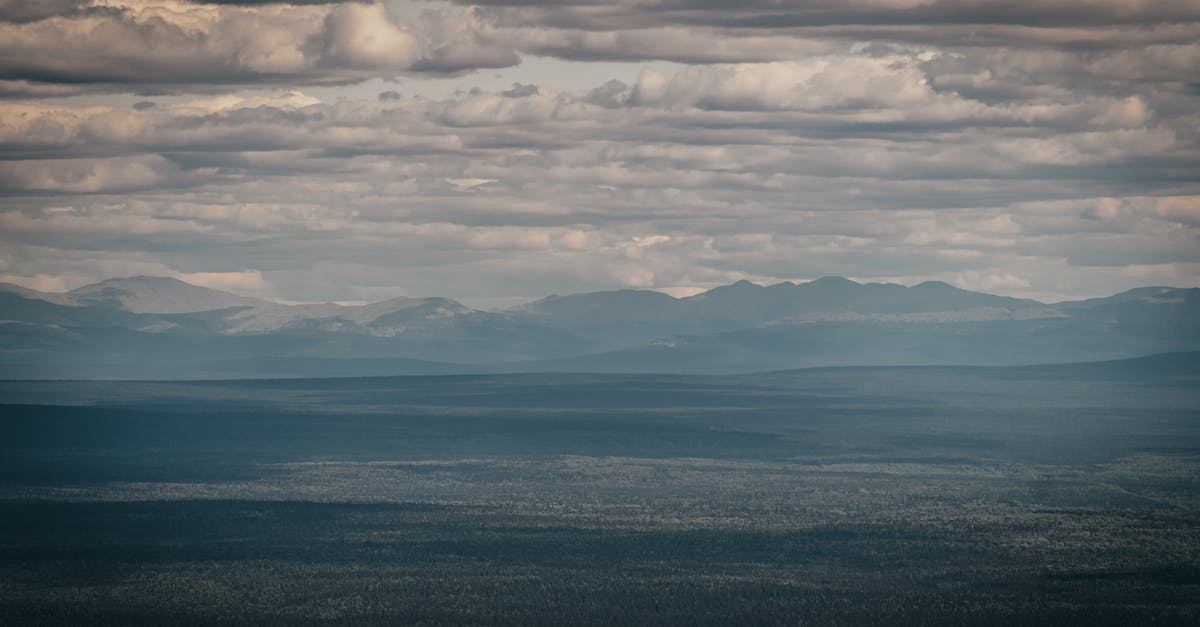 Why didn't Yuri Zhivago leave Russia with Lara and Victor? - An Aerial View of a Mountain Range