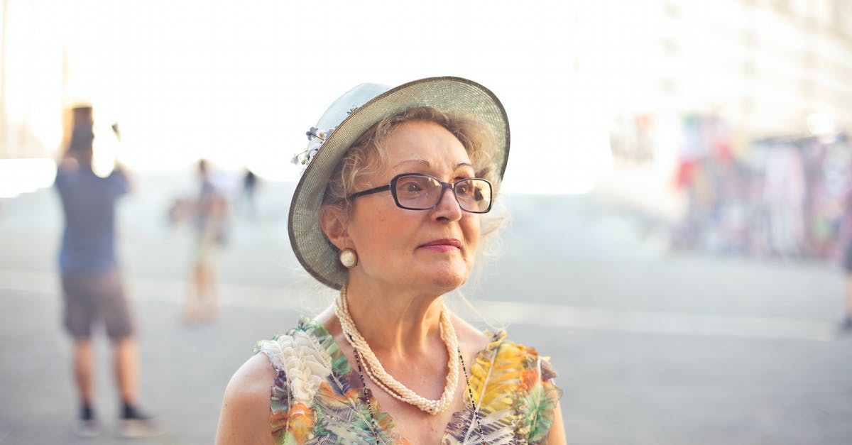 Why do actors in old movies look old? - Depth of Field Photography of Woman in Pastel Color Sleeveless Shirt and White Sunhat