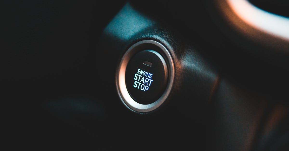 Why do some movies start with a big rotating circle and countdown? - Convenient round button on black elegant dashboard of interior in contemporary comfortable automobile